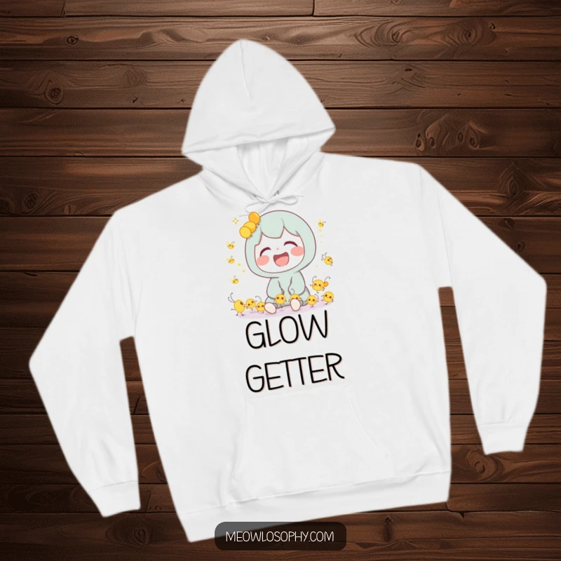Funny Hoodie showing a cute character having a hearty laugh amidst a cluster of tiny, cheerfully dancing fireflies.