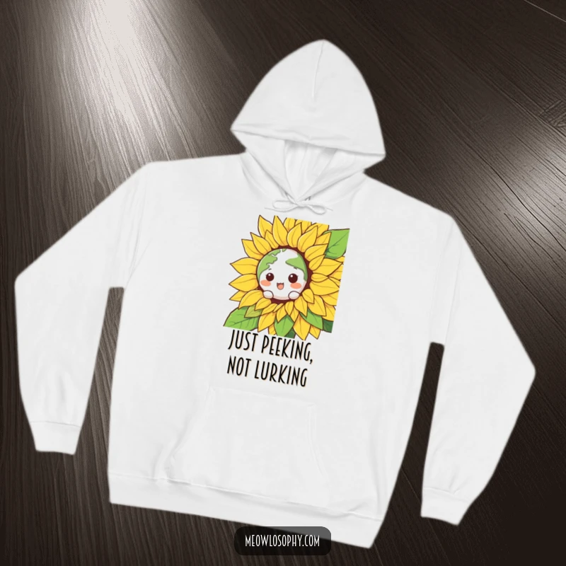Funny Kawaii Earth character peeking from a smiling sunflower, featured on a warm hoodie, perfect for cozy, humorous wear.