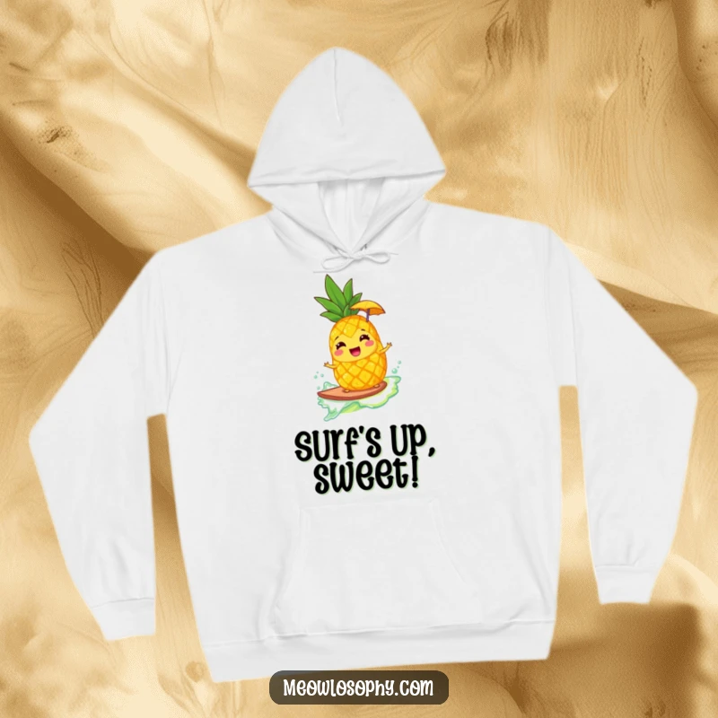 Funny hoodie with a giggling pineapple wearing an umbrella, surfing a lemonade wave, perfect for cozying up with a tropical vibe.