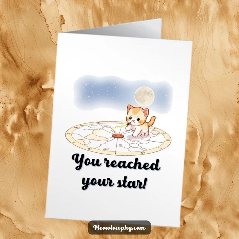 Funny Free Printable Congratulations Card: A swift, playful kitten chases a laser beam across a detailed celestial map, full of cosmic excitement.