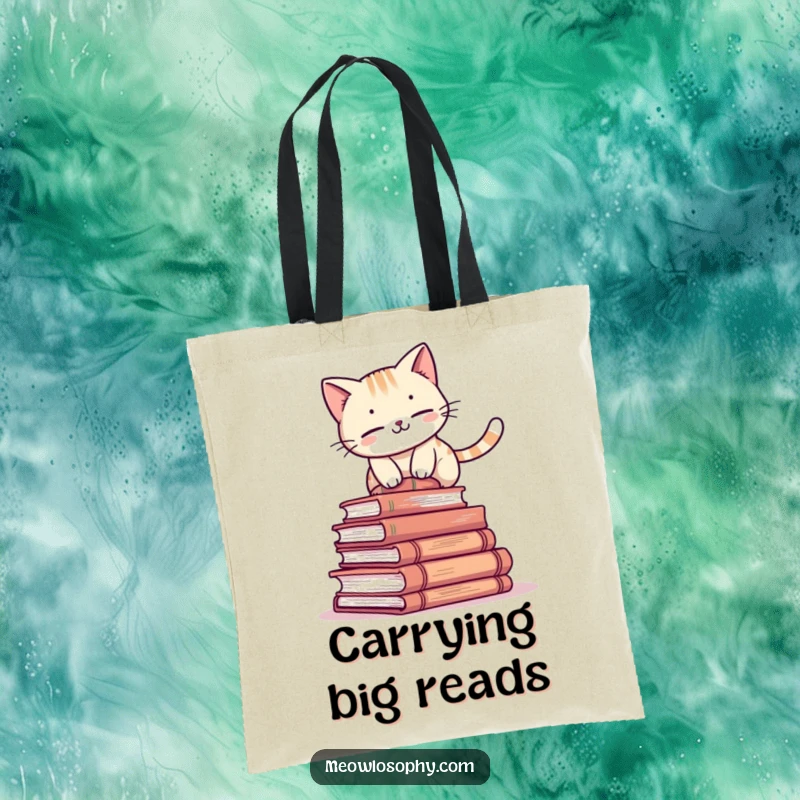 Funny cat tote bag with an adorable character attempting to balance on a stack of ancient books, humorous and practical accessory.